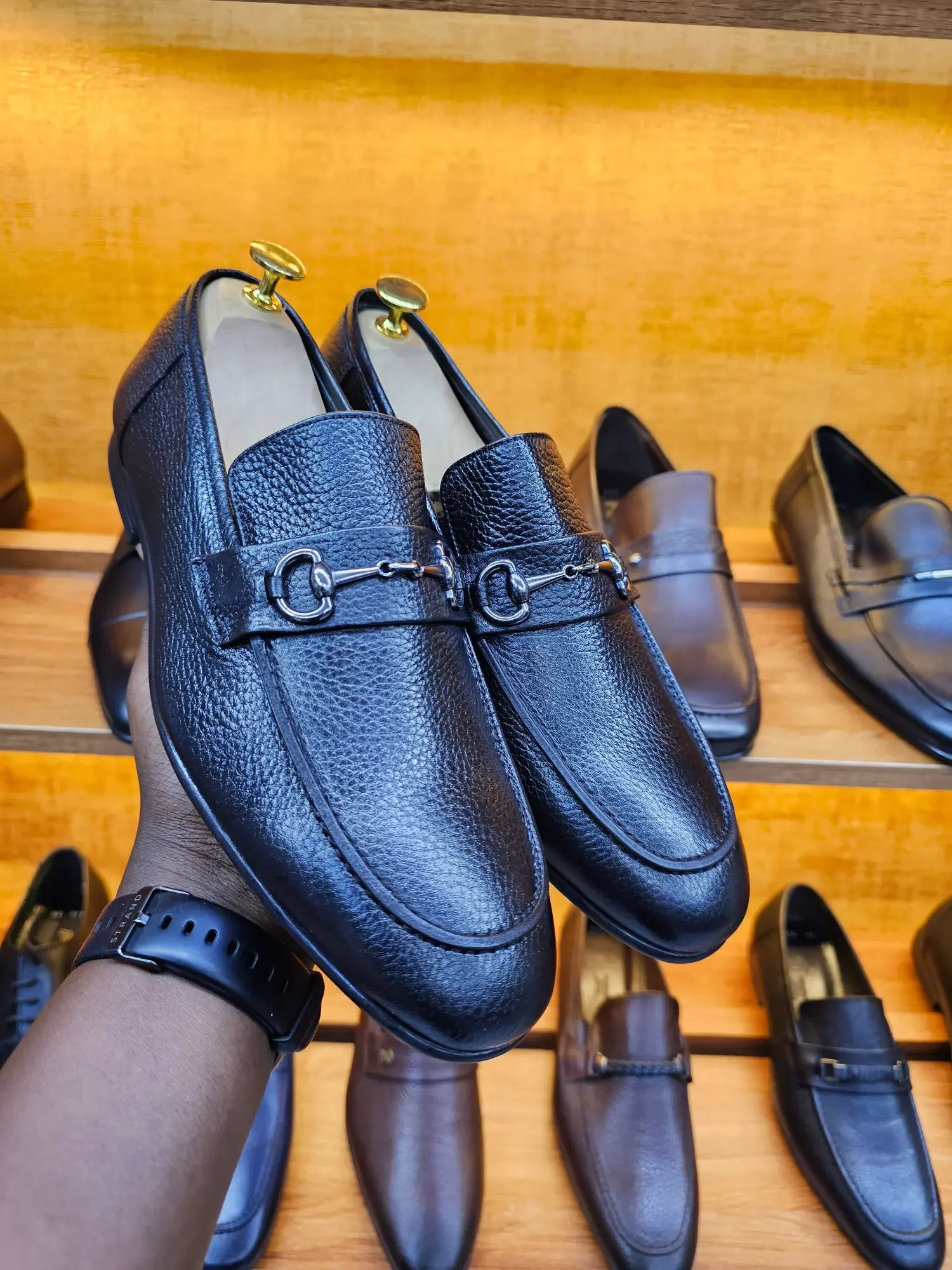 black snaffle trim loafers