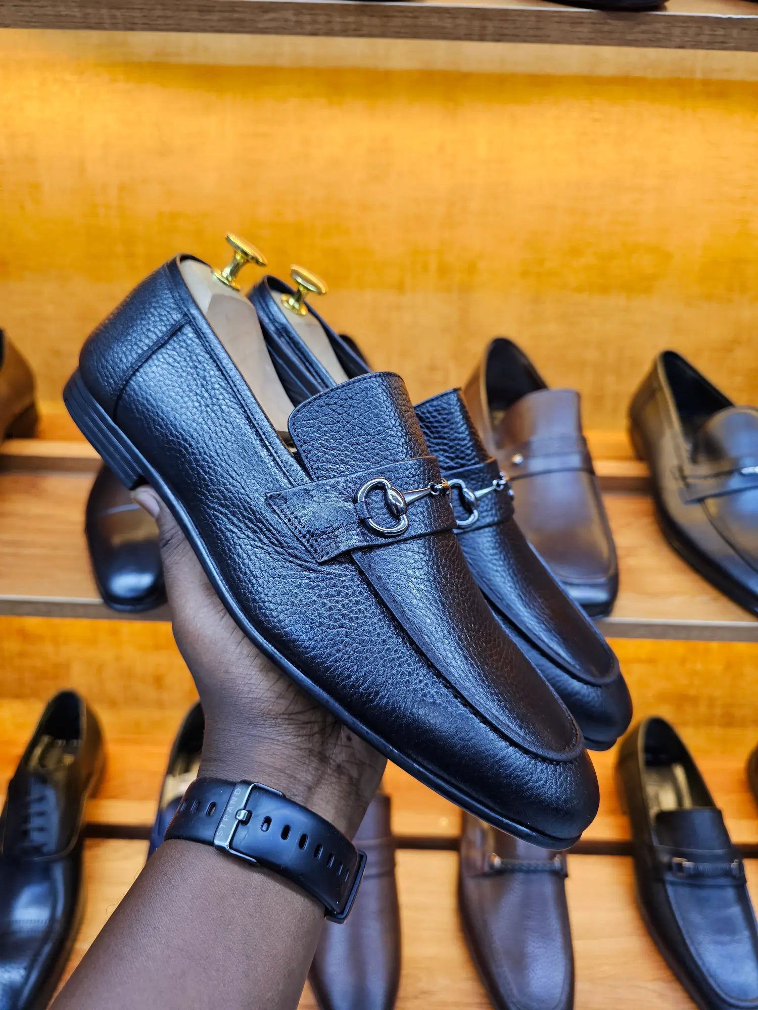 black snaffle trim loafers