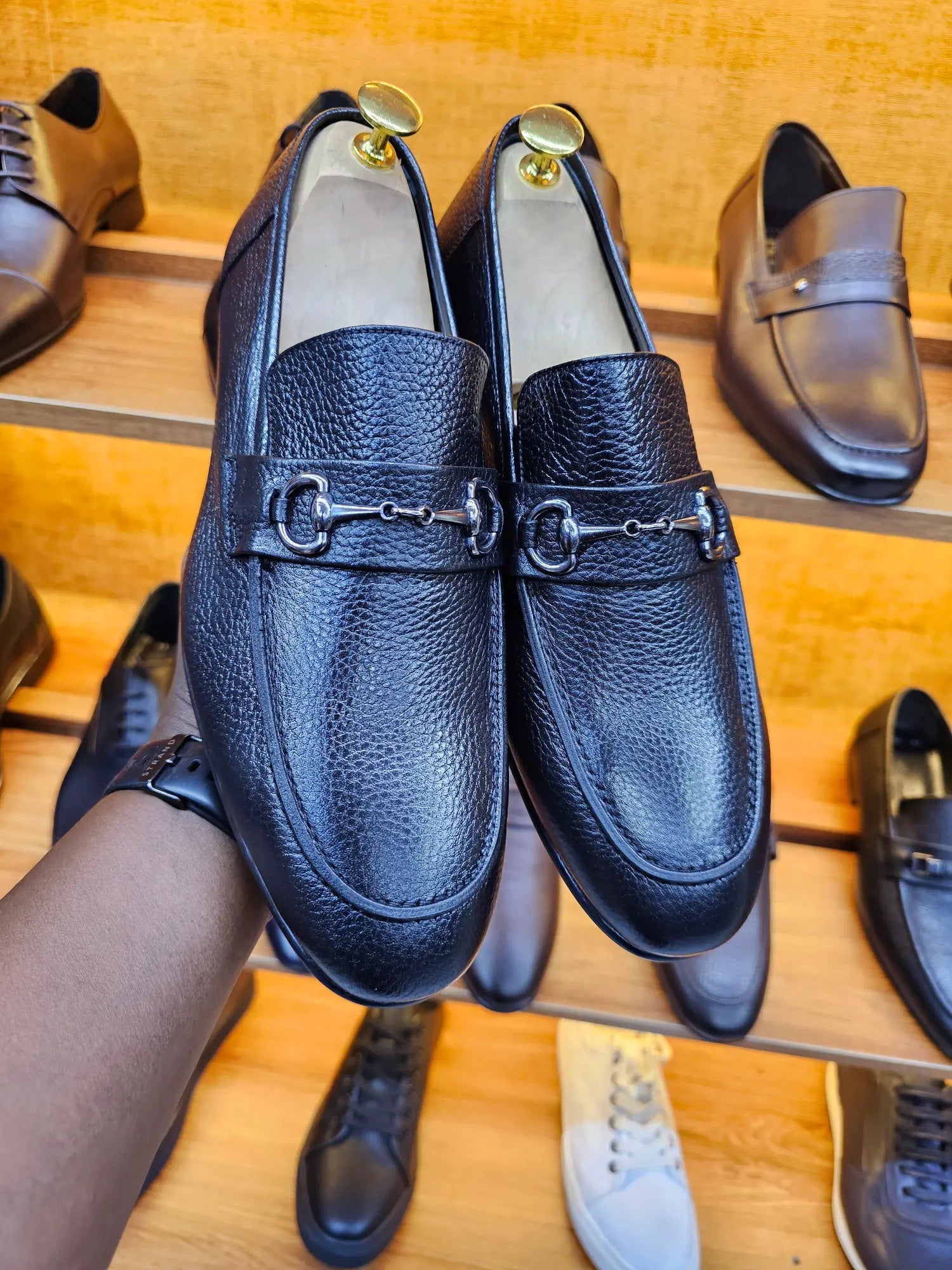 black snaffle trim loafers