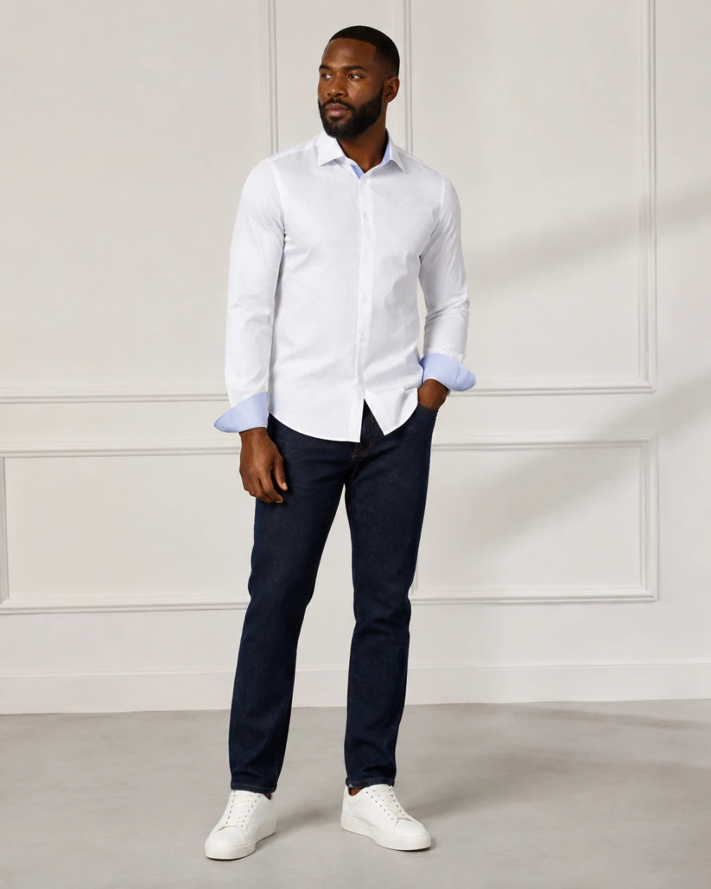 Infynite White Slim Fit Dress Shirt flat lay showing blue contrast collar lining and blue contrast cuffs, clean white body with small buttons on a white background