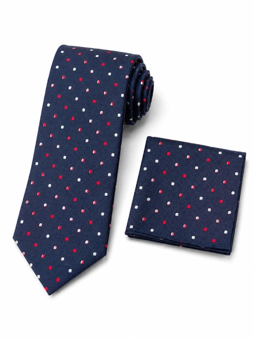 Infynite navy blue polka dot tie and pocket square set with red and white dots laid flat on white background