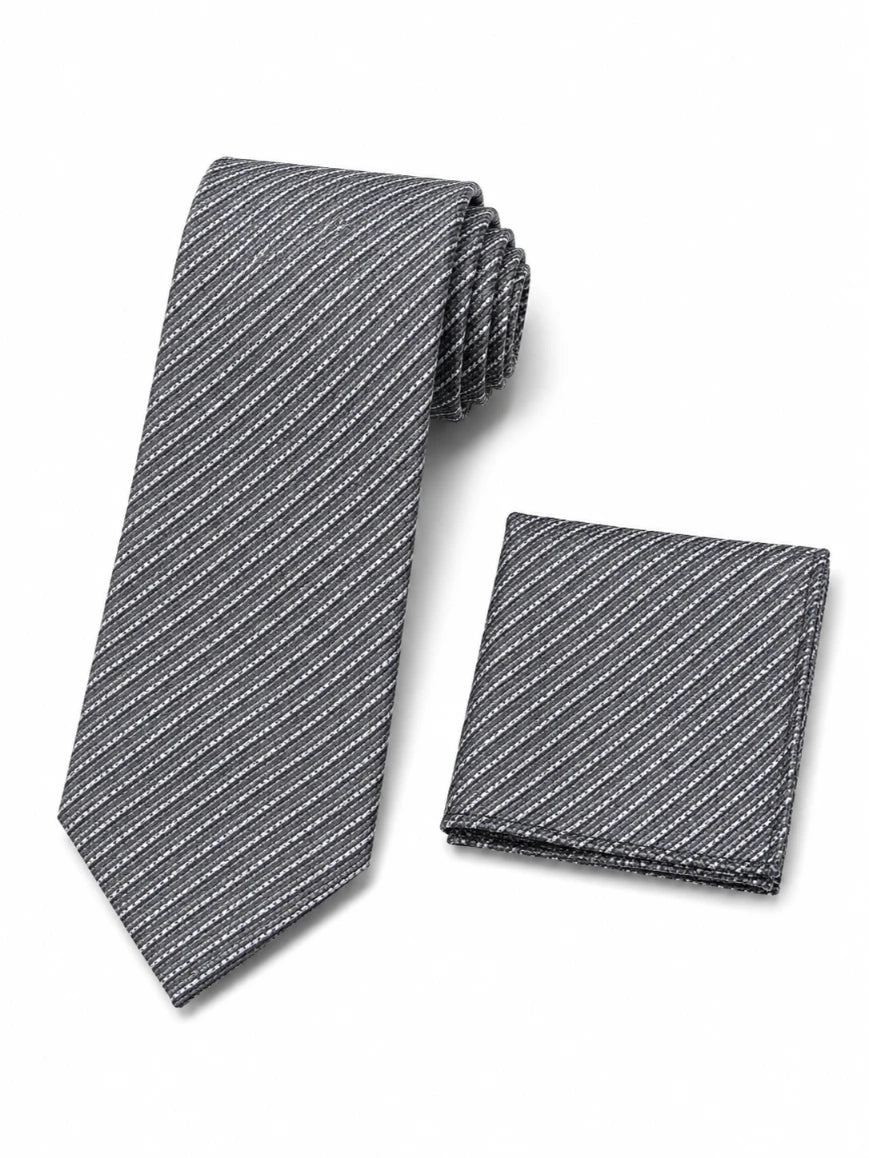 Infynite charcoal grey fine diagonal pin-stripe tie and pocket square set with silver-white hairline stripes on textured woven base laid flat on white background
