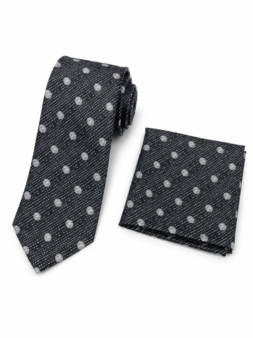 Infynite jet black and silver polka dot woven texture tie and pocket square set with cross-hatch woven base laid flat on white background
