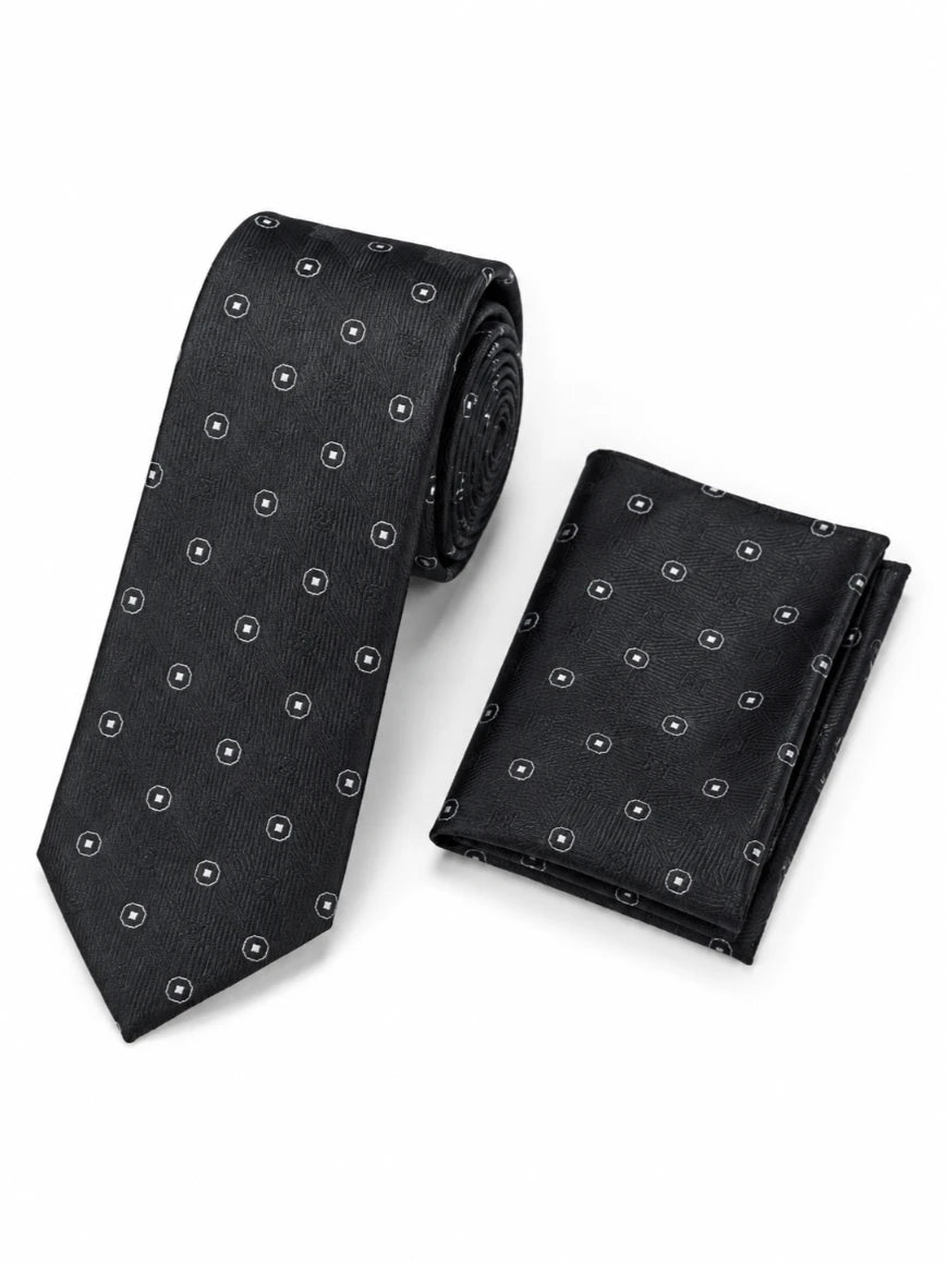 Infynite jet black micro circle-square medallion jacquard tie and pocket square set with tonal watermark woven base and white micro-medallion motifs laid flat on white background