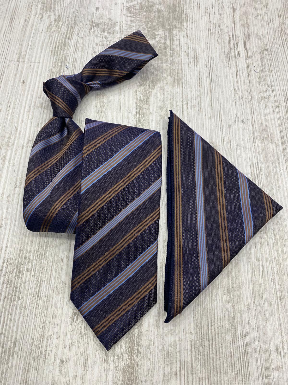 Navy striped tie and matching pocket square on a light wooden surface