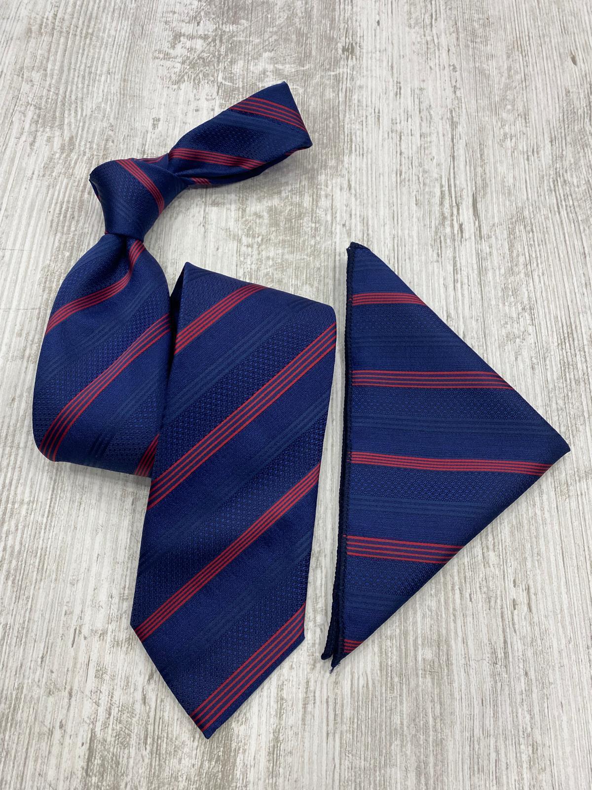 Blue and red striped tie and pocket square on a light wooden surface