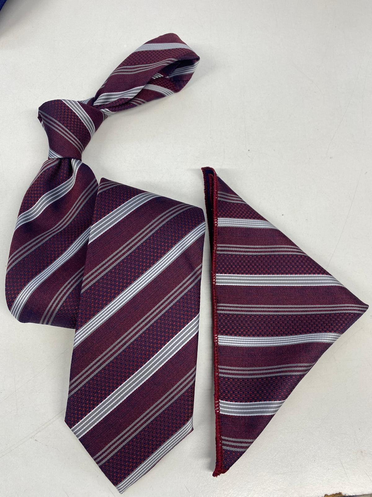 Maroon striped tie and matching pocket square on a white background