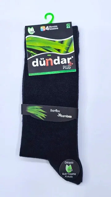 Black socks with Dundar Plus packaging on a white background