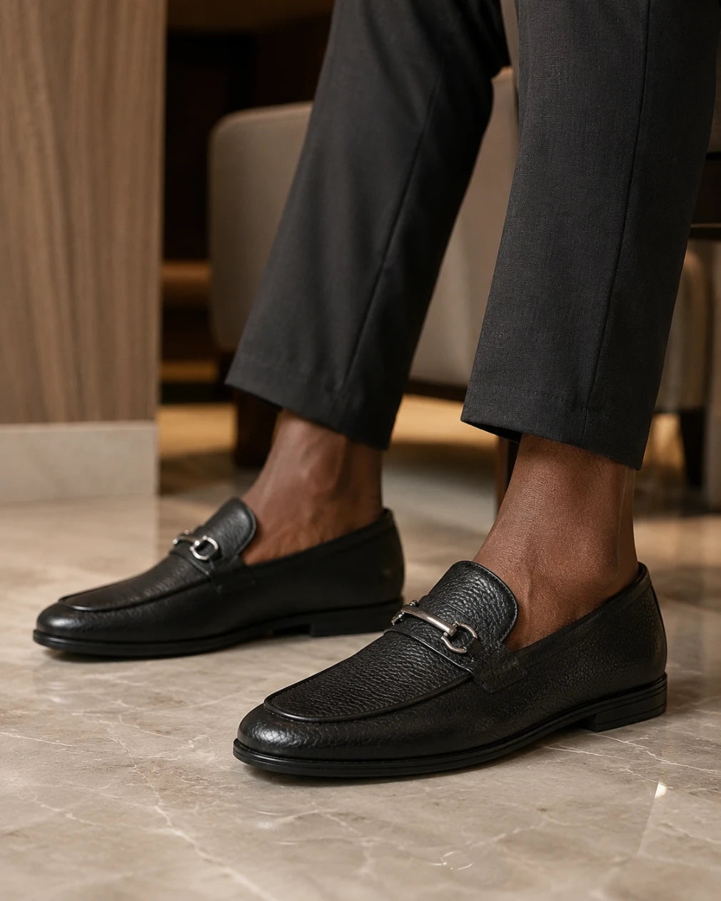 black horsebit loafer on a man's feet