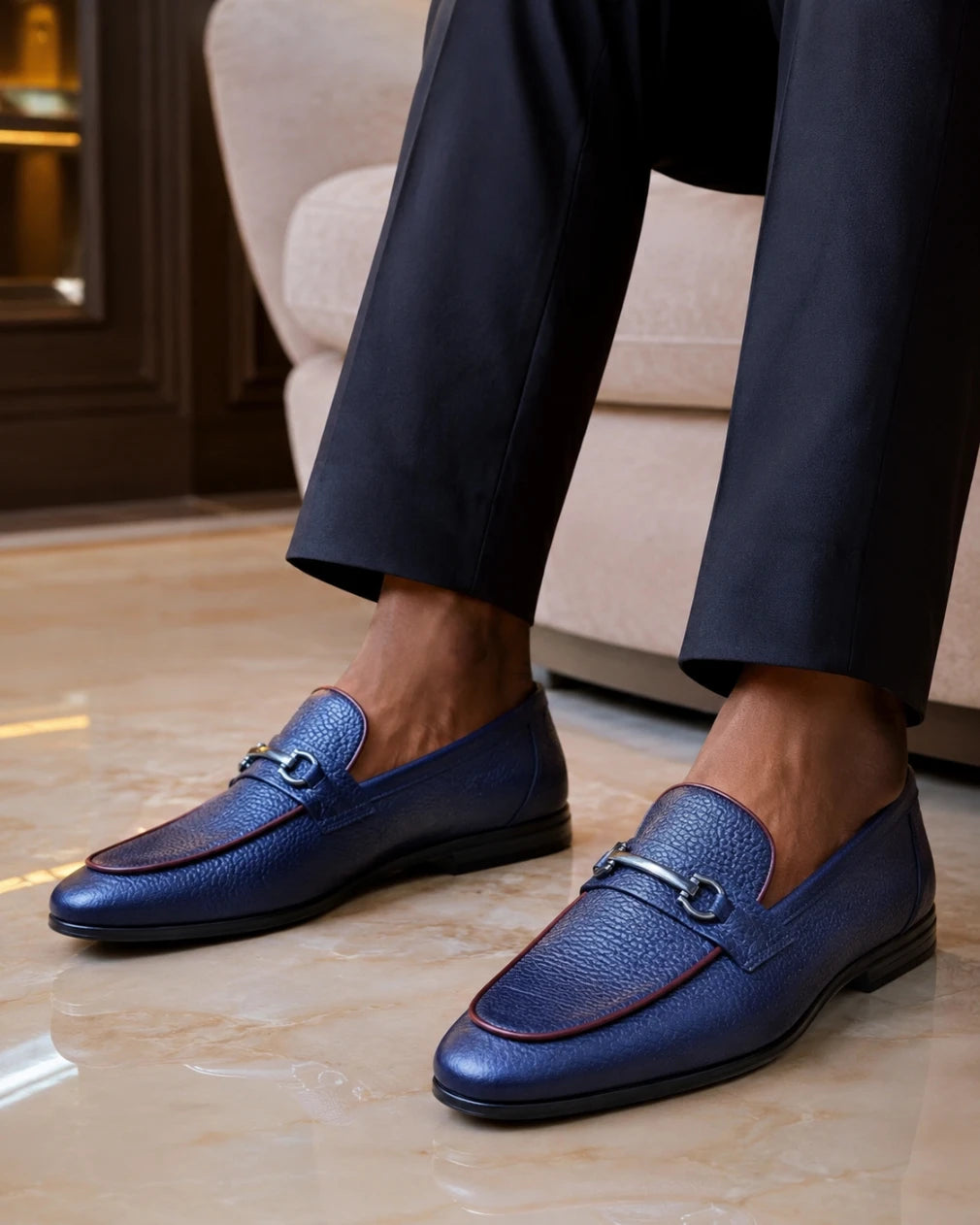 blue horsebit loafer on a man's feet