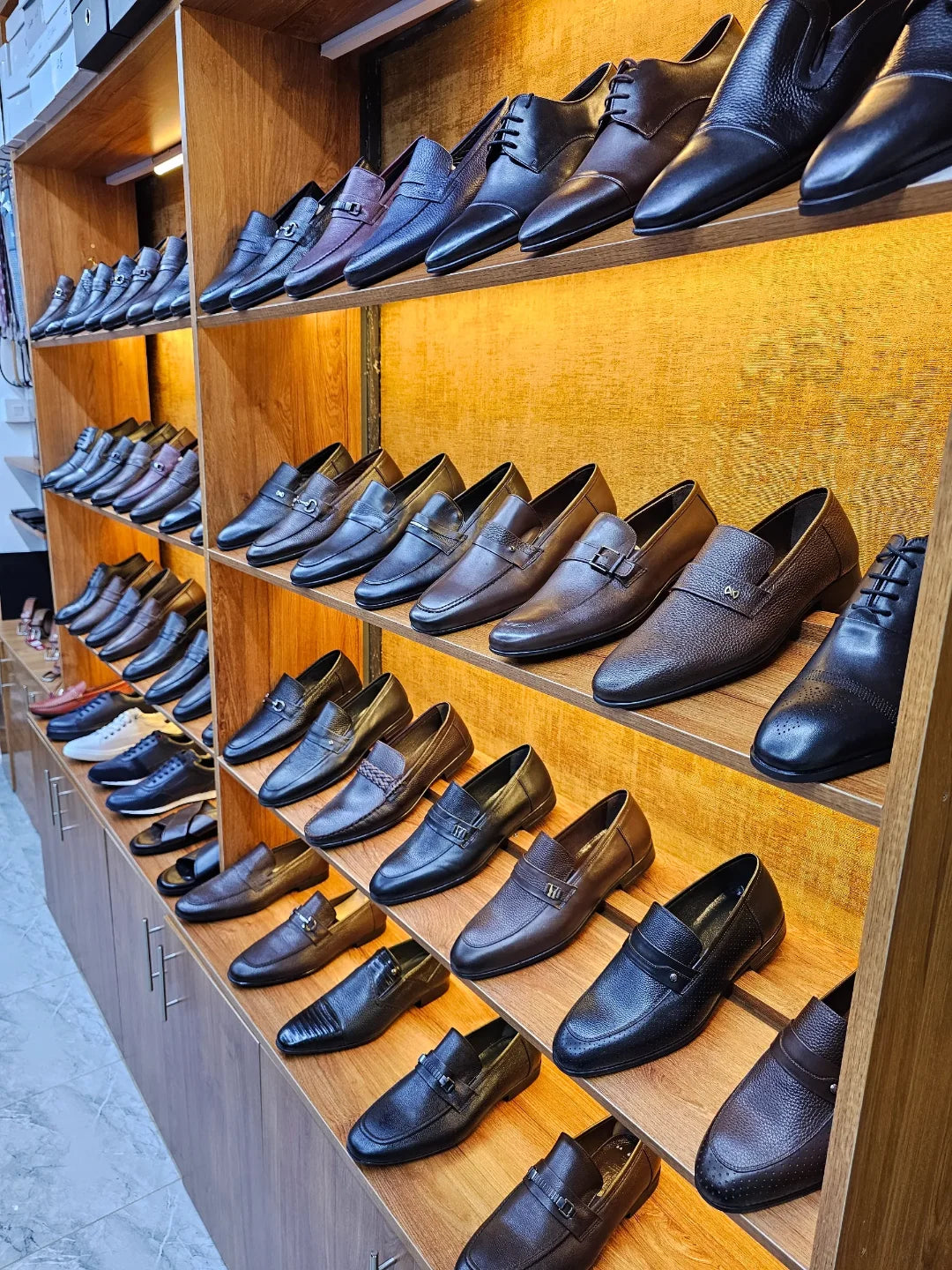 premium shoes on a wooden display