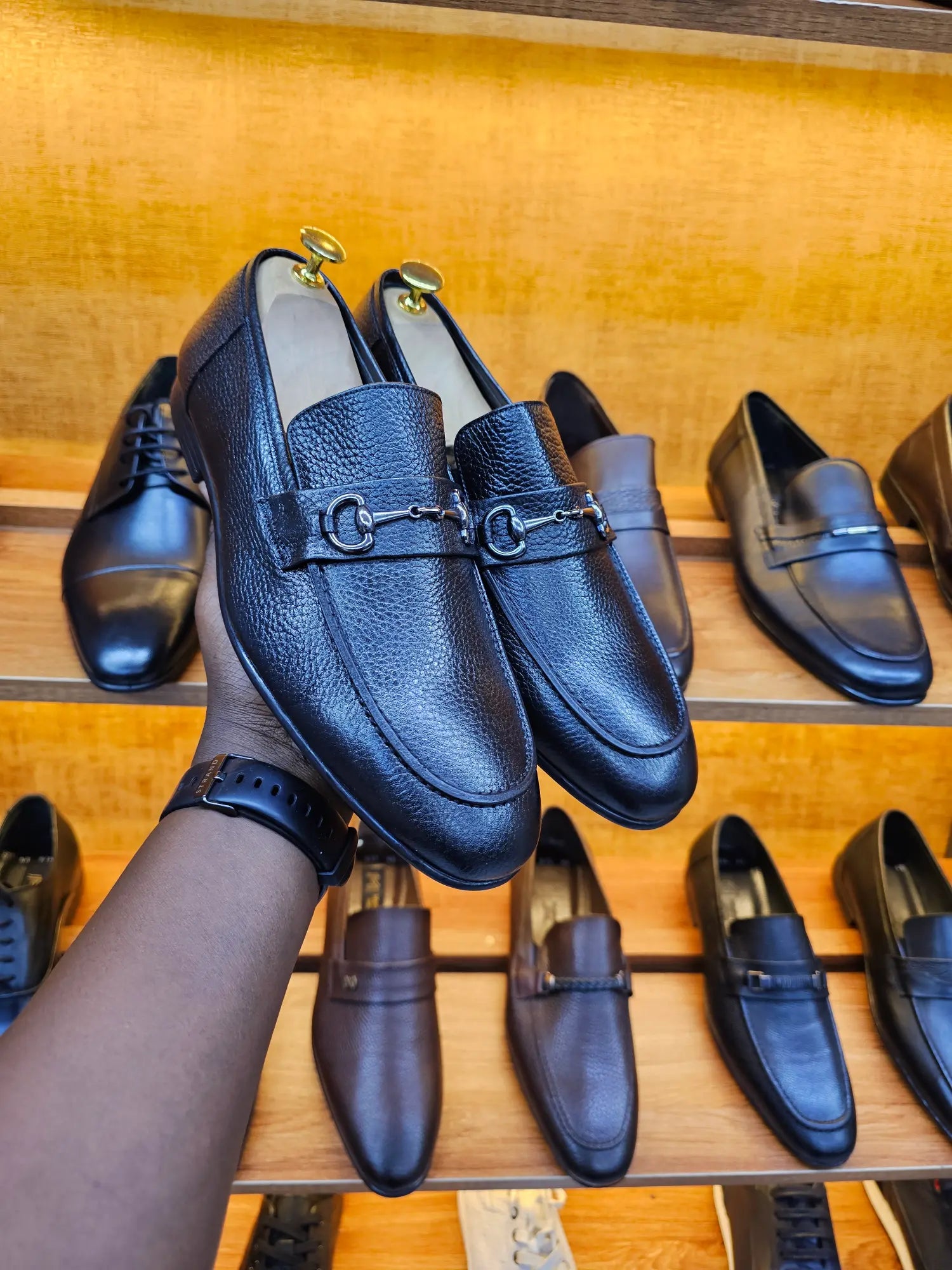 black snaffle trim loafers