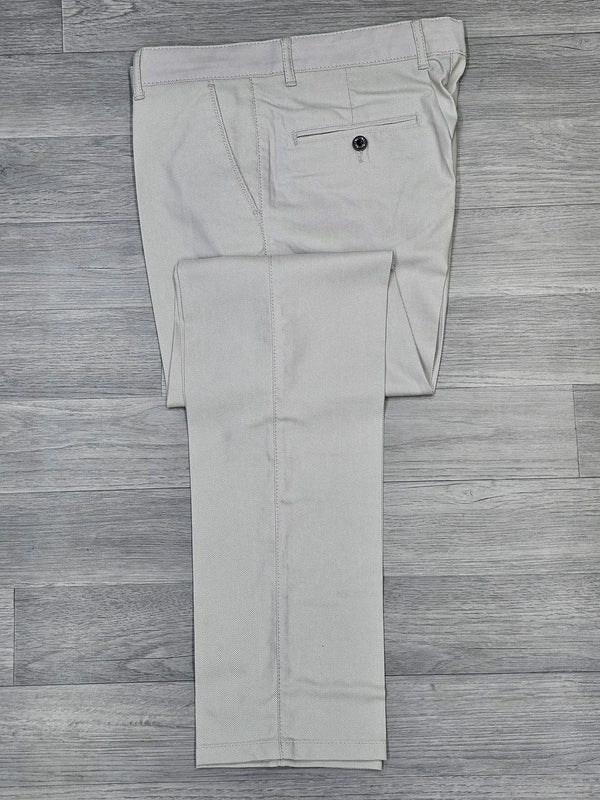 Cream regular fit chino pants on a wooden floor