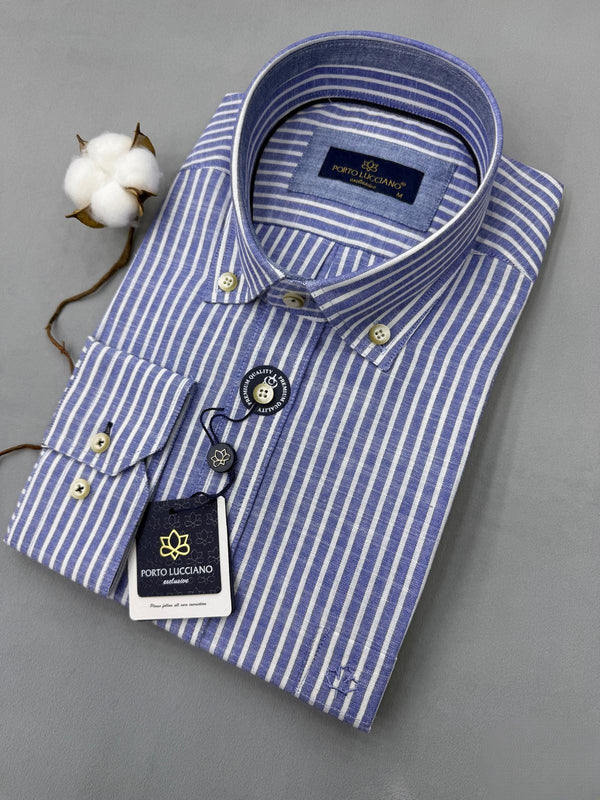Blue and white striped shirt with Porto Lucciano tag on a gray background