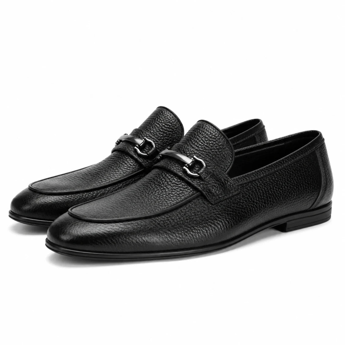 black horsebit loafer  on a white background