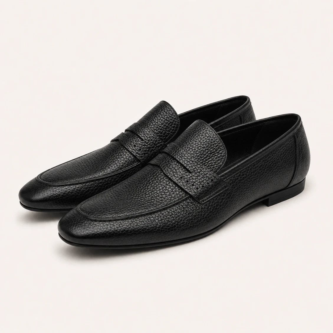 Pair of brown leather shoes on a white background